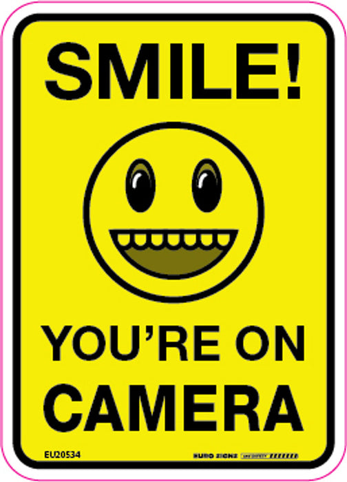 Sign SMILE! YOU'RE ON CAMERA +graphic Blk/Ylw - w90 x h125mm DECAL